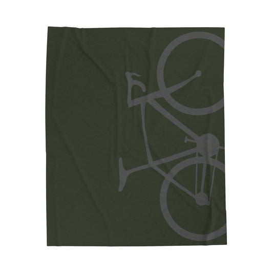 Olive green biking throw blanket, ideal for cozy nights, featuring a stylish cycling-themed design.