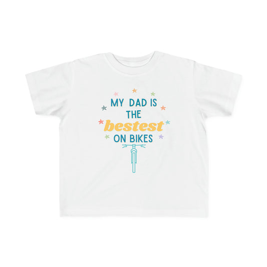 Kid's biking t-shirt featuring 'My Dad is the Bestest on Bikes' design, celebrating fatherhood and biking fun.