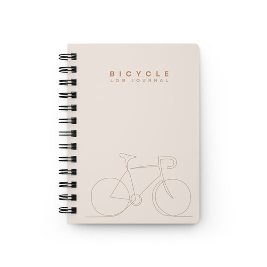 Spiral journal featuring bicycle-themed cover for tracking rides