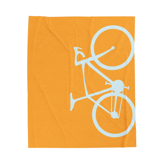 Yellow biking throw blanket, ideal for cycling enthusiasts and cozy evenings.